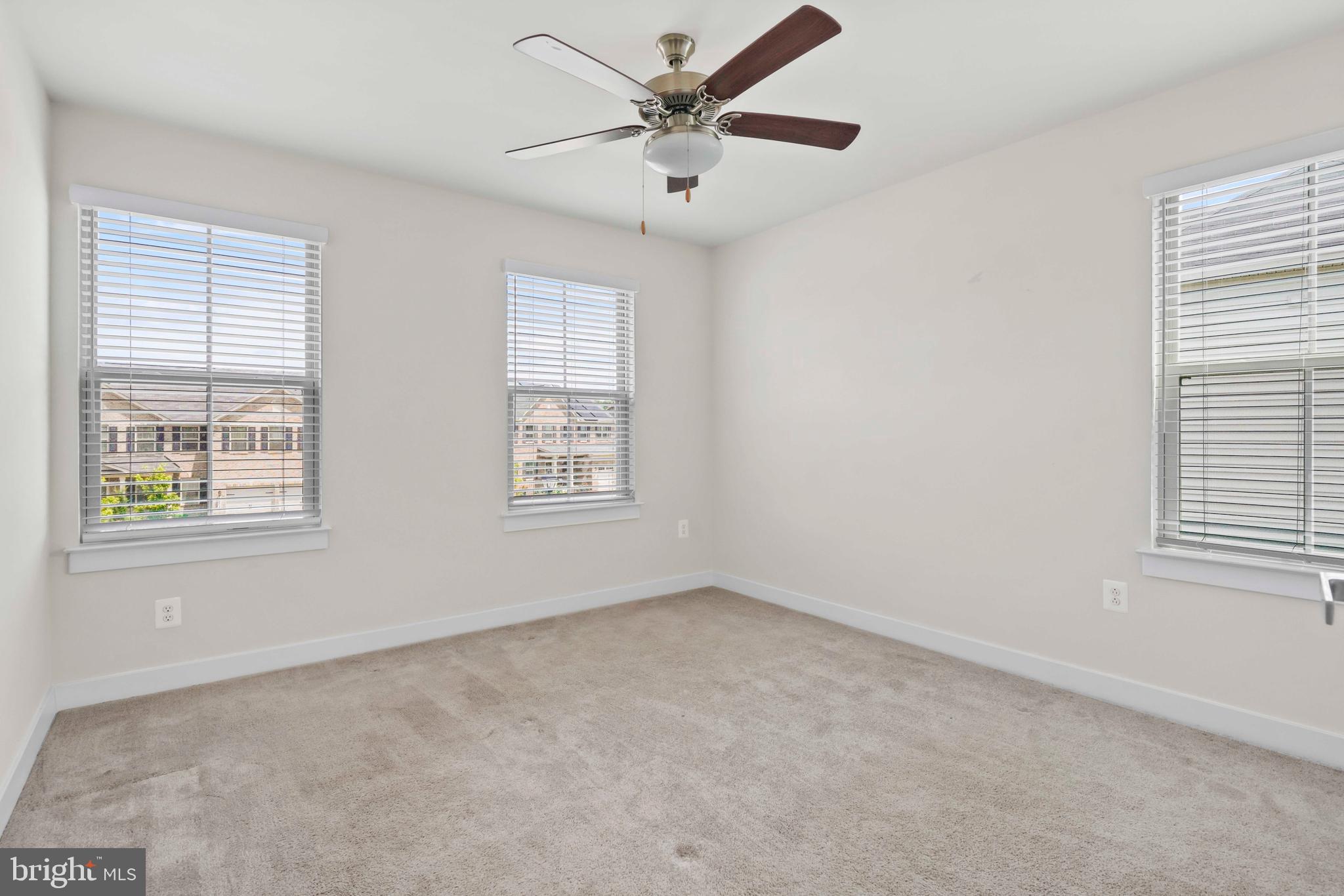 3903 Emory Ridge Road Brandywine, MD 20613 - Photo 27 of 42 an empty room with windows and fan