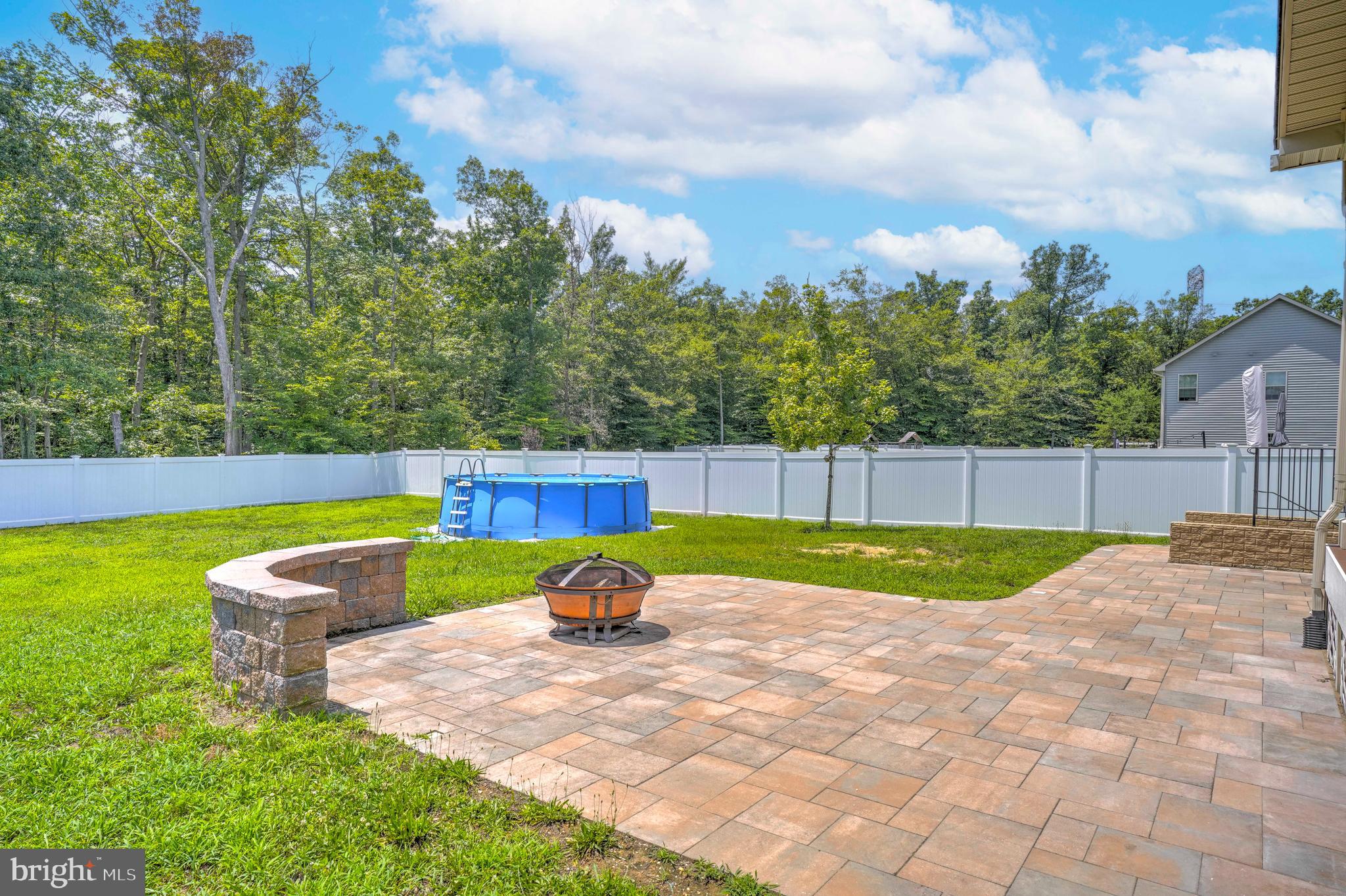3903 Emory Ridge Road Brandywine, MD 20613 - Photo 36 of 42 a view of a backyard with swimming pool