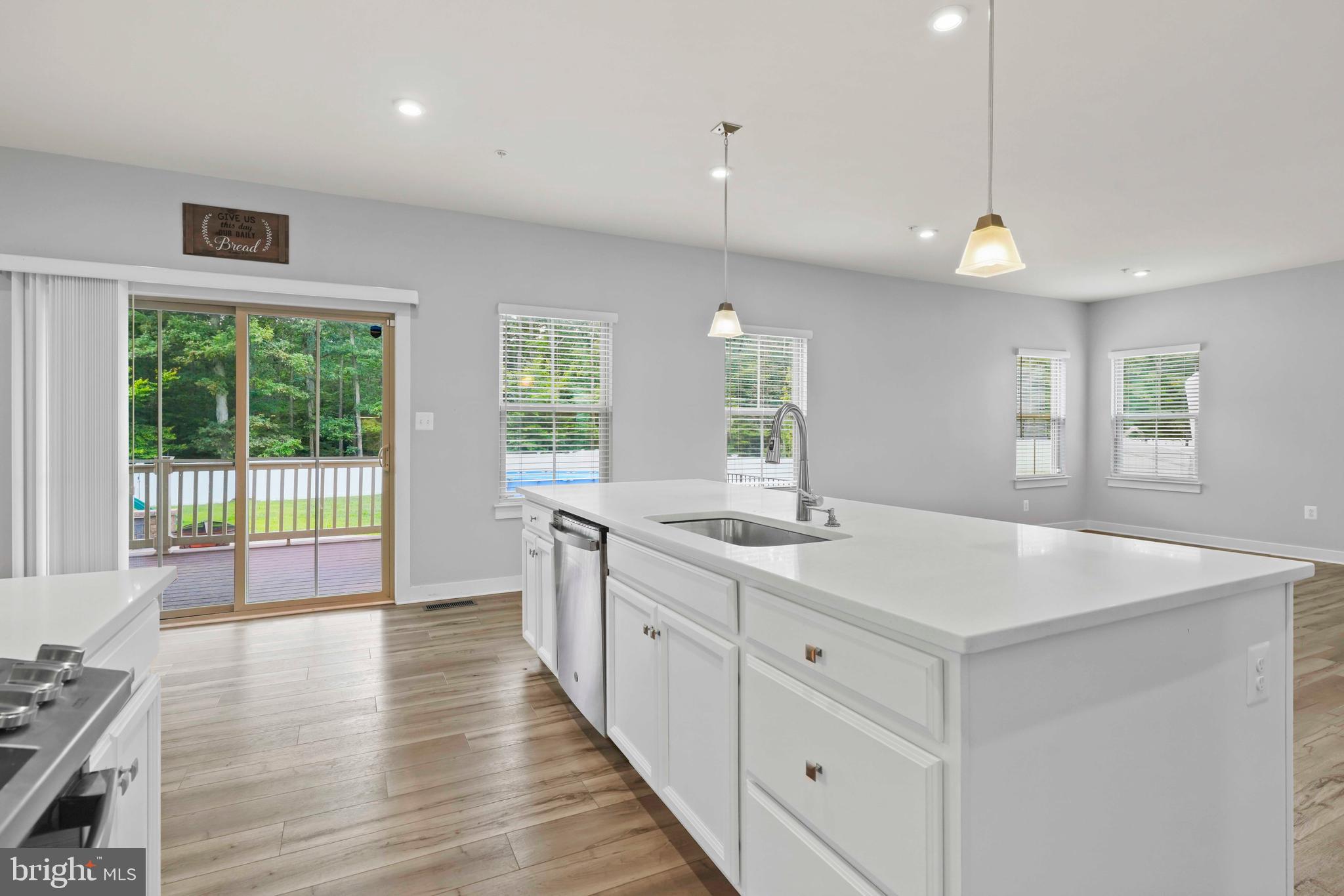 3903 Emory Ridge Road Brandywine, MD 20613 - Photo 7 of 42 a view of a kitchen sink and wooden floor