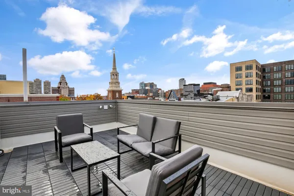a view of a terrace with seating space