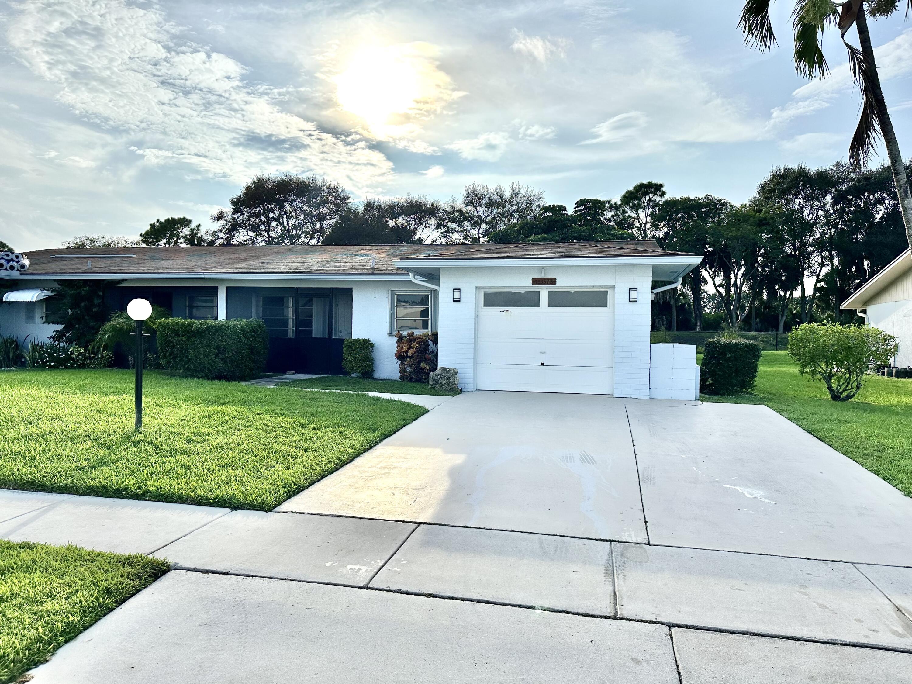 a view of house with outdoor space