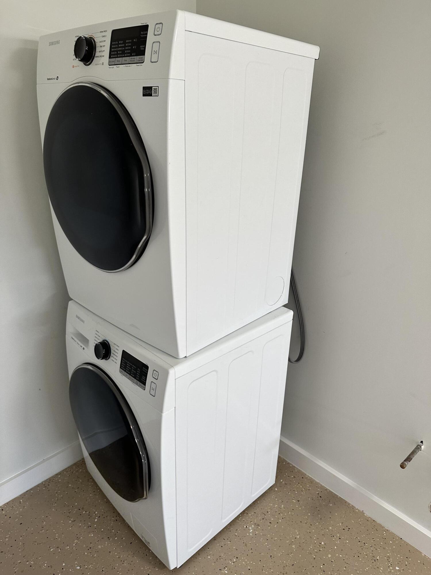 13357 Vía Vesta, Unit B Delray Beach, FL 33484 - Photo 15 of 26 a utility room with dryer and washer