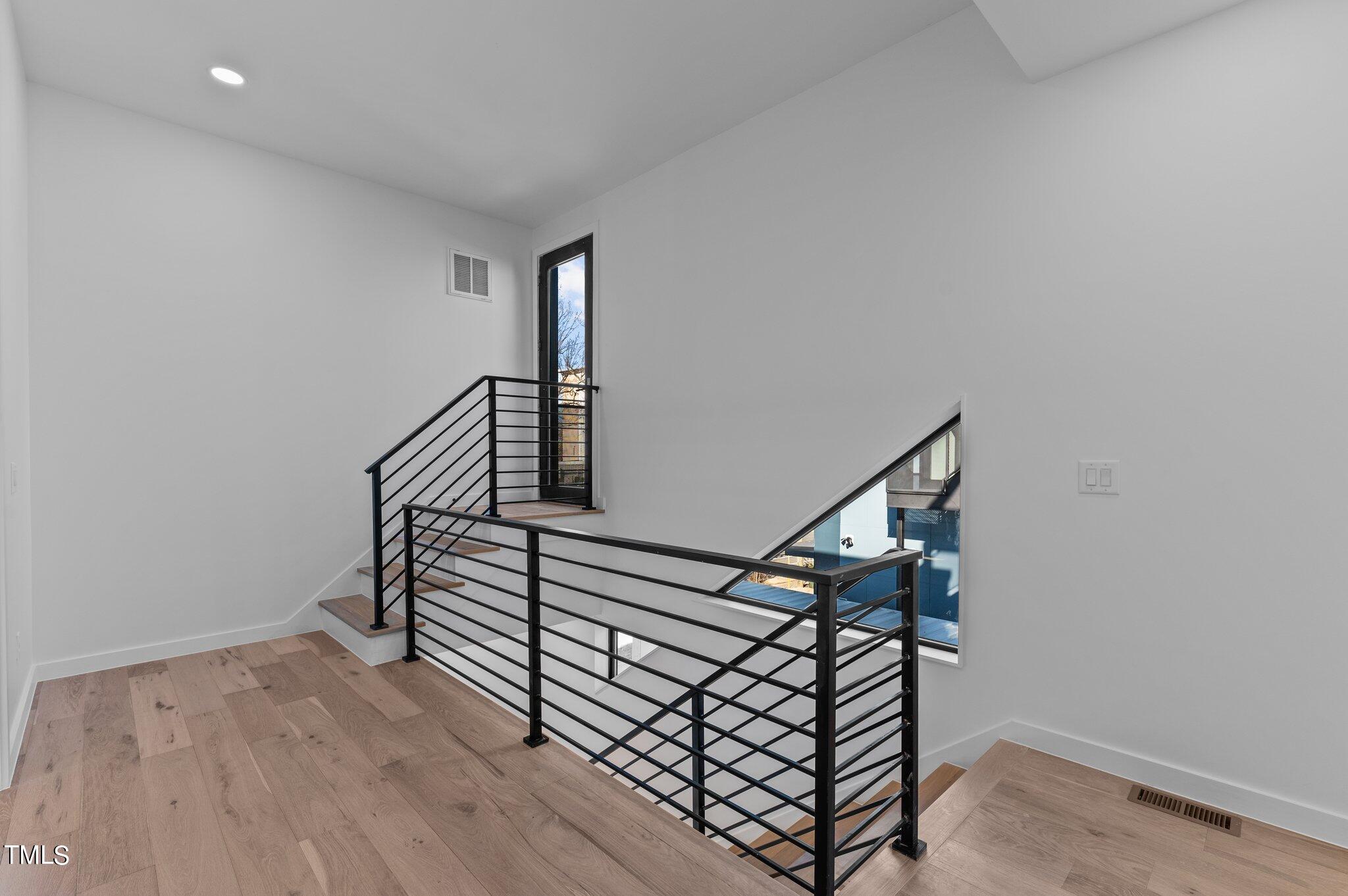 819 South Person Street Raleigh, NC 27601 - Photo 12 of 33 a view of entryway with wooden floor