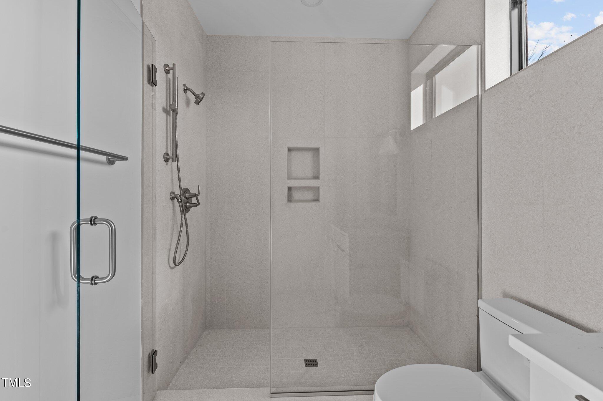 819 South Person Street Raleigh, NC 27601 - Photo 16 of 33 a bathroom with a shower