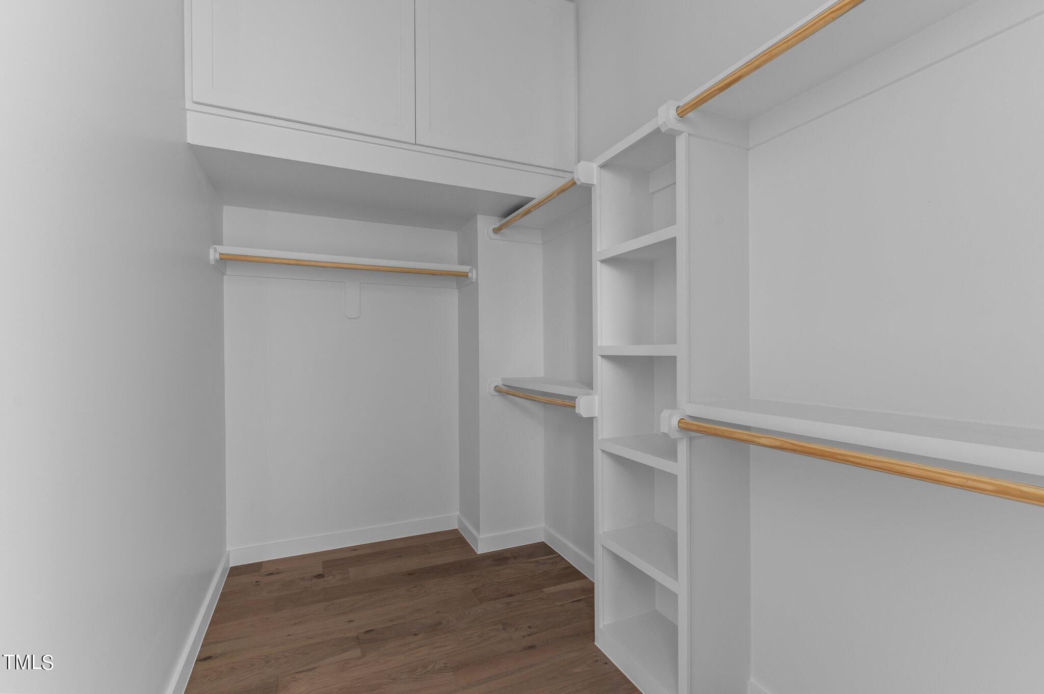 819 South Person Street Raleigh, NC 27601 - Photo 17 of 33 a view of walk in closet with empty racks