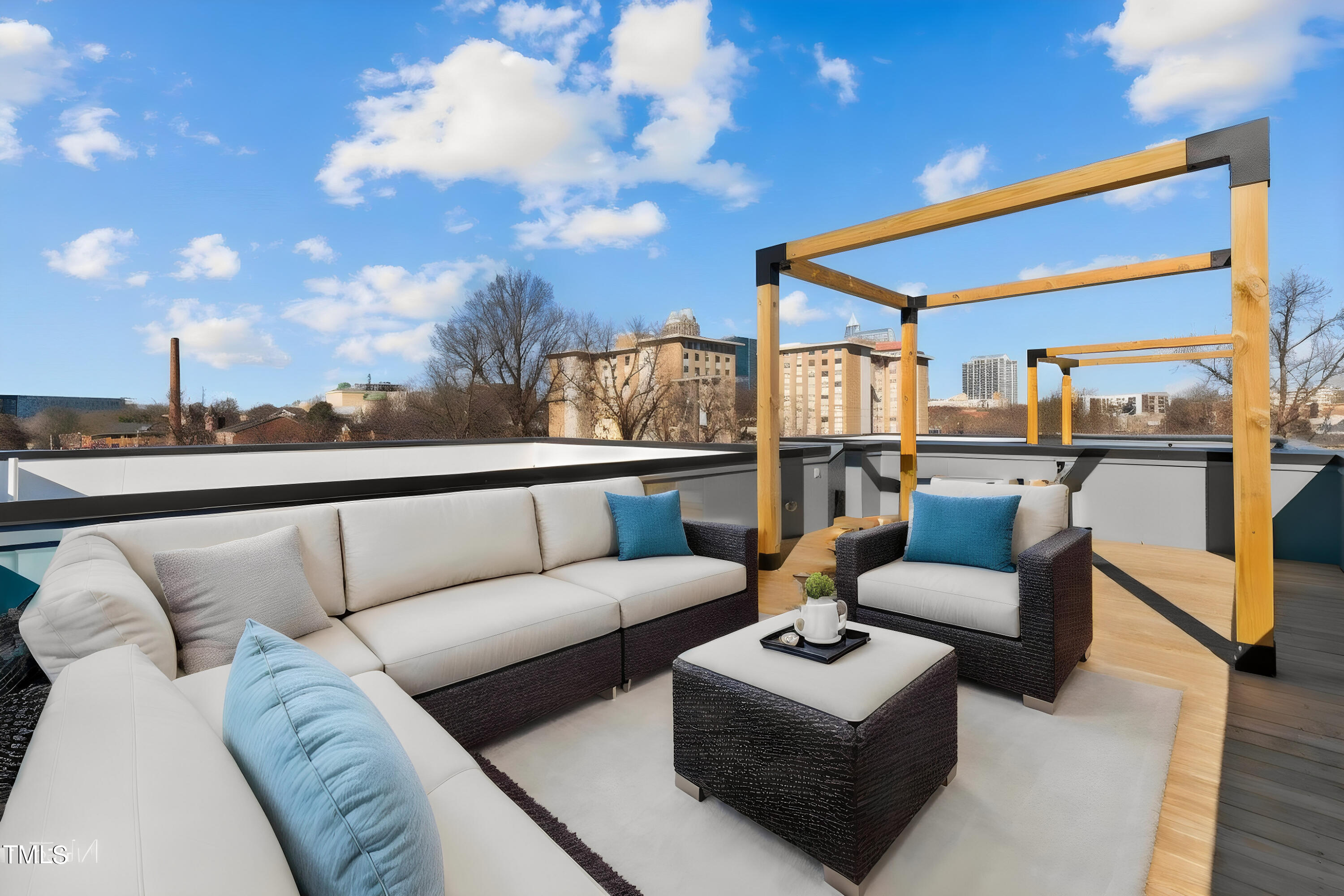 819 South Person Street Raleigh, NC 27601 - Photo 26 of 33 a balcony with furniture and a potted plant