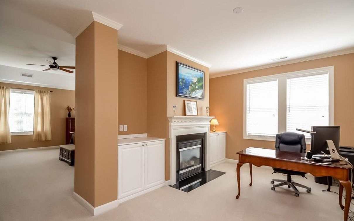 2913 Elmfield Street Raleigh, NC 27614 - Photo 17 of 30 Master bedroom sitting area with cozy fireplace which can be used as office space Master Bedroom Sitting Area