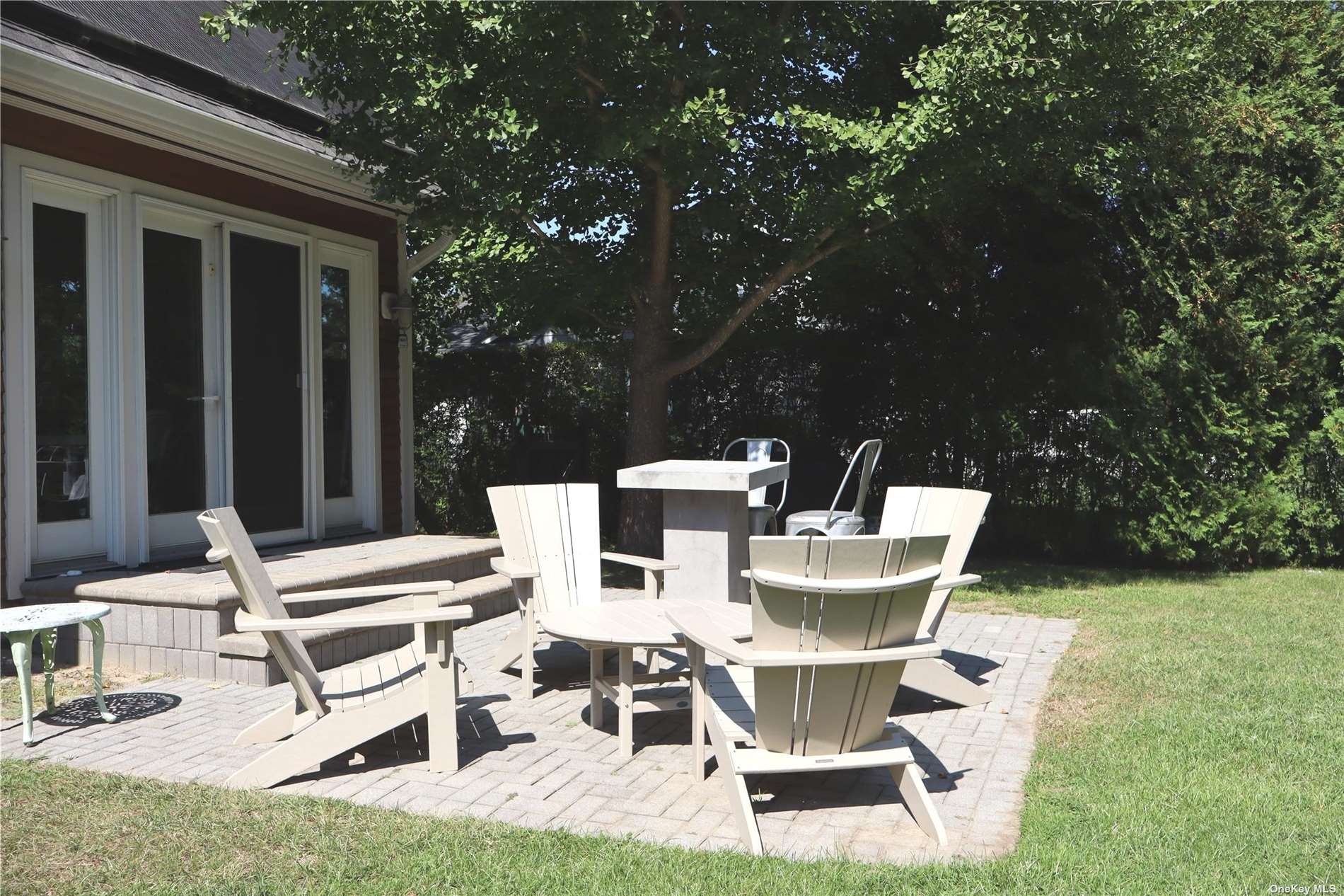 6 Remsenburg, undefined 00000 - Photo 24 of 31 a view of backyard of house with seating space