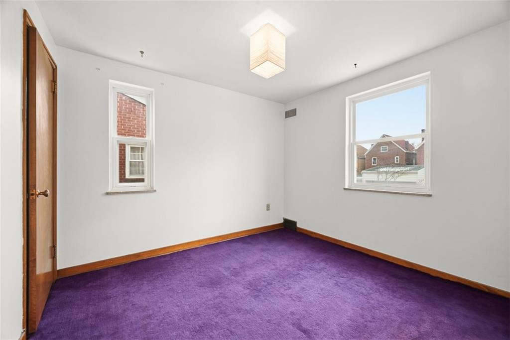 7210 Raymond Street Pittsburgh, PA 15218 - Photo 18 of 37 a view of an empty room with a window