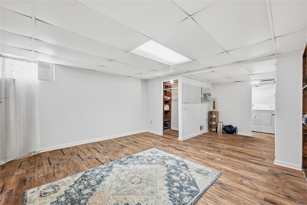 7210 Raymond Street Pittsburgh, PA 15218 - Photo 21 of 37 a view of a room with wooden floor