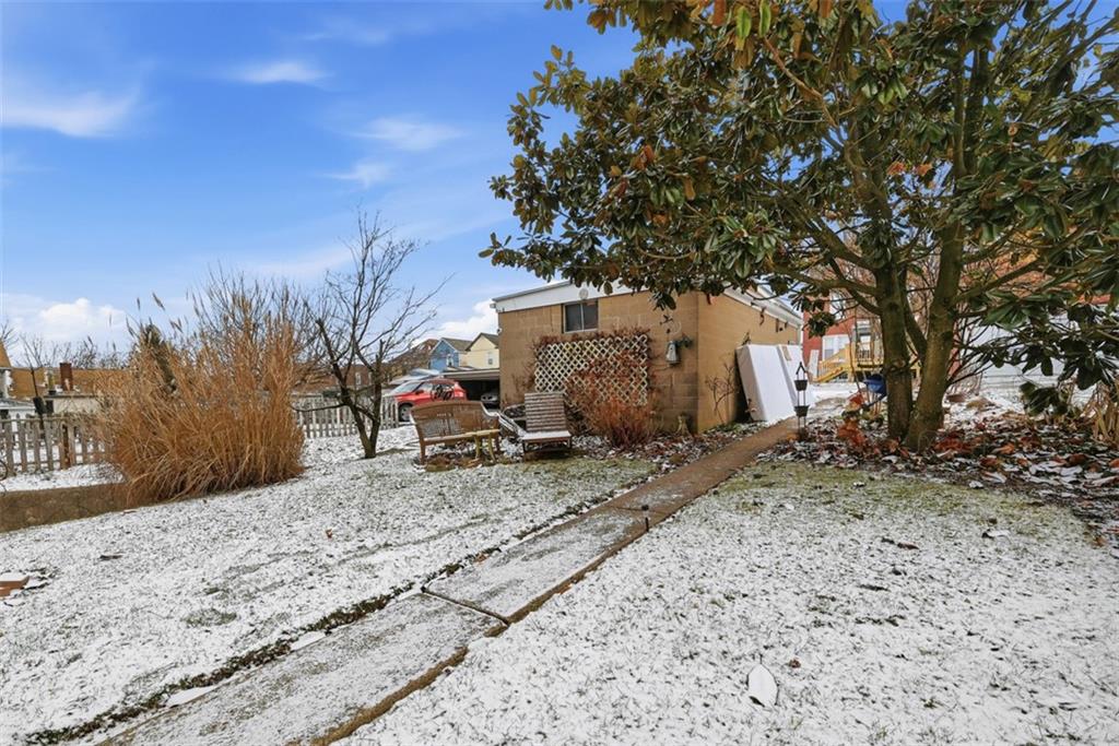 7210 Raymond Street Pittsburgh, PA 15218 - Photo 26 of 37 a backyard of a house with large trees