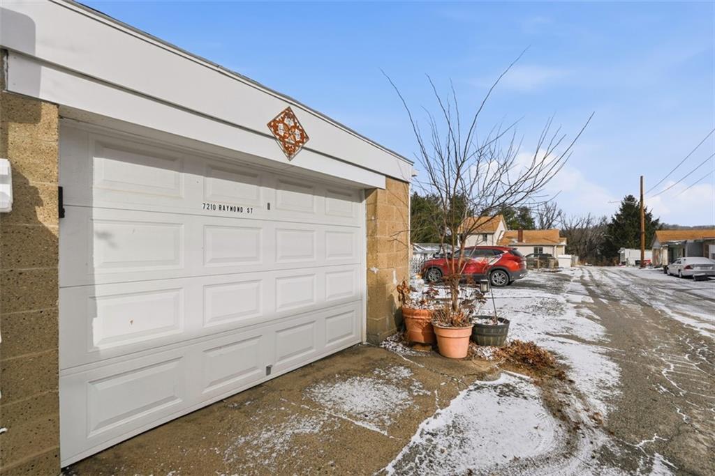 7210 Raymond Street Pittsburgh, PA 15218 - Photo 28 of 37 a view of a entrance gate of the house and cars parked