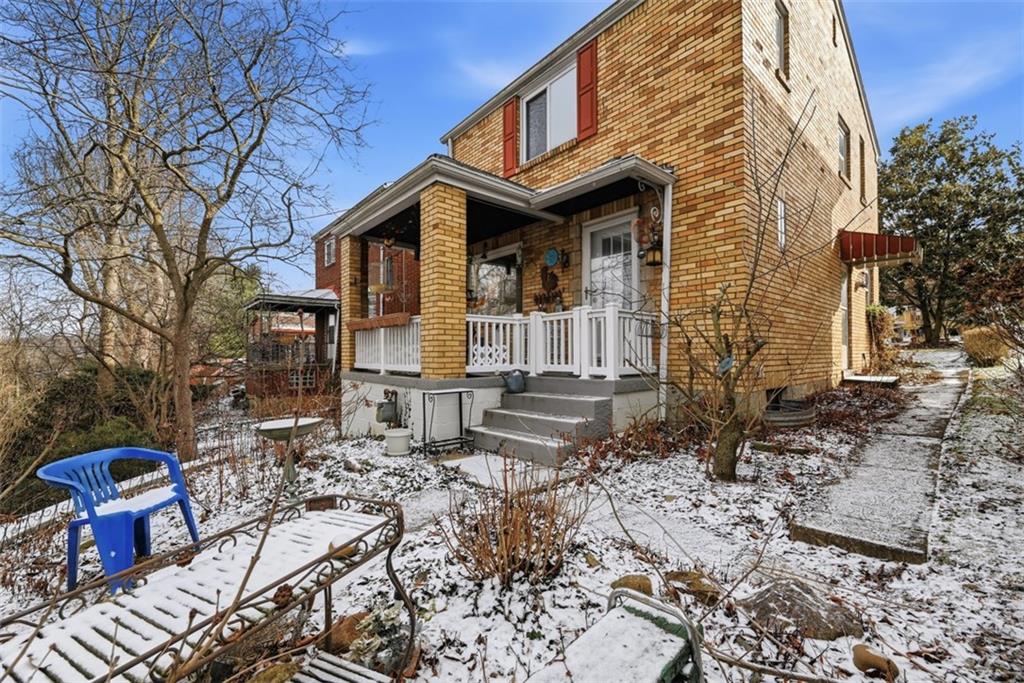 7210 Raymond Street Pittsburgh, PA 15218 - Photo 30 of 37 a front view of a house with sitting area