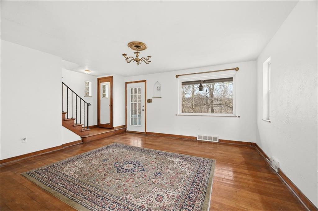 7210 Raymond Street Pittsburgh, PA 15218 - Photo 4 of 37 an empty room with windows