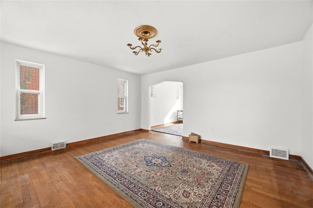 7210 Raymond Street Pittsburgh, PA 15218 - Photo 6 of 37 a view of a hallway with a window