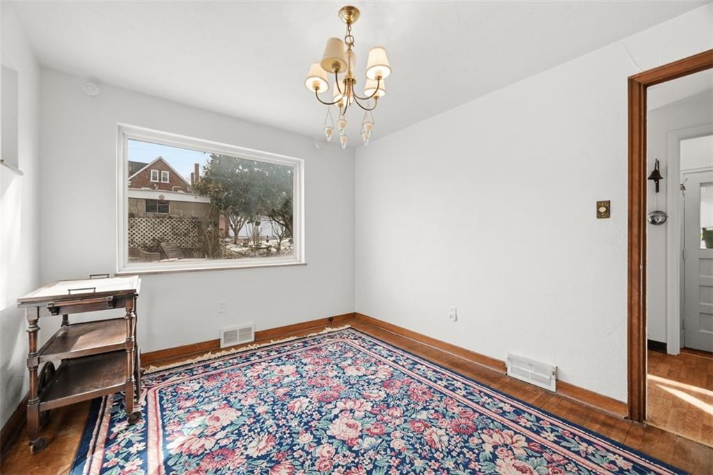 7210 Raymond Street Pittsburgh, PA 15218 - Photo 7 of 37 a view of a hallway with workspace and window