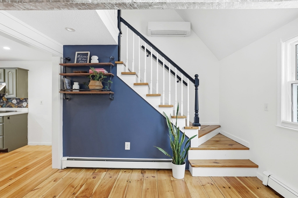 34 Flintlock Ridge Road Cohasset, MA 02025 - Photo 13 of 33 a view of entryway and hall with wooden floor