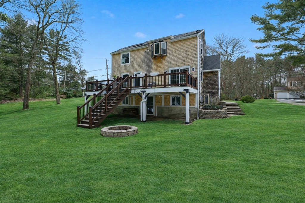 34 Flintlock Ridge Road Cohasset, MA 02025 - Photo 33 of 33 a view of a house with a park