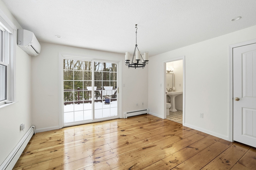 34 Flintlock Ridge Road Cohasset, MA 02025 - Photo 8 of 33 a view of an empty room with a window