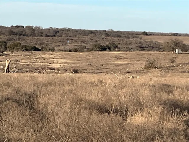a view of mountain with lake view