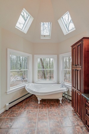 9 Crockett Road Upton, MA 01757 - Photo 17 of 22 a room with furniture and a window