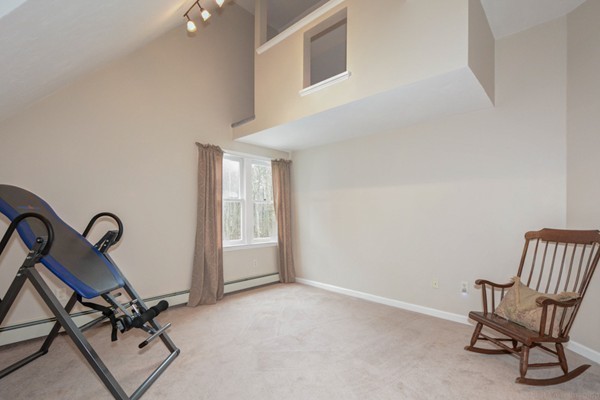 9 Crockett Road Upton, MA 01757 - Photo 19 of 22 a view of a workspace with furniture and a window