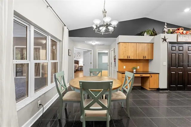 a bedroom with a bed and a view of bathroom