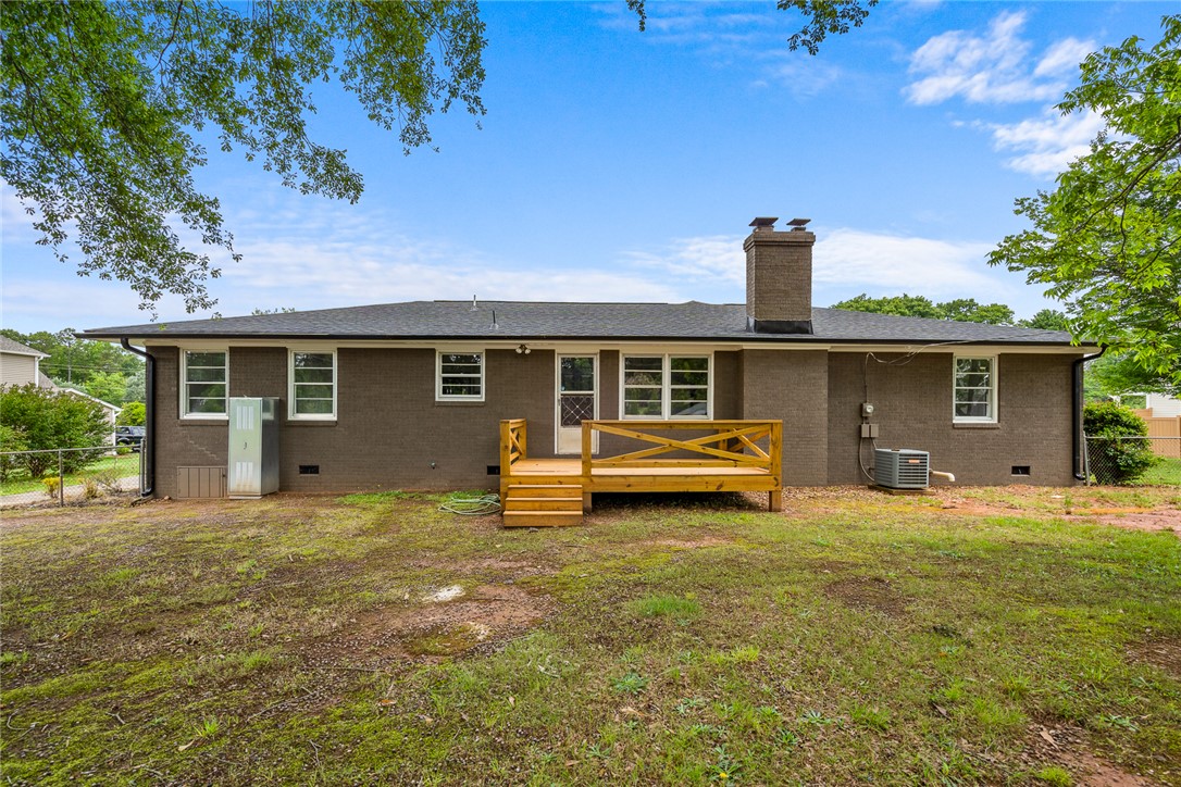 300 Vandiver Road Anderson, SC 29621 - Photo 23 of 30 A quaint rear deck extends from this brick residence, offering direct access to a spacious yard.