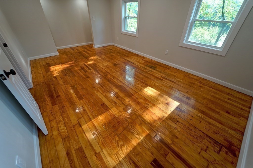 4 Juniper Road Holbrook, MA 02343 - Photo 14 of 27 a bedroom with wooden floor and window