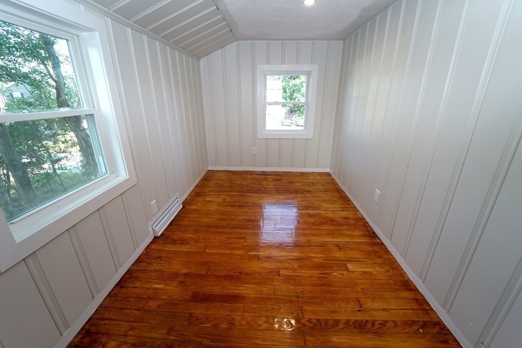 4 Juniper Road Holbrook, MA 02343 - Photo 17 of 27 a view of a hallway with windows