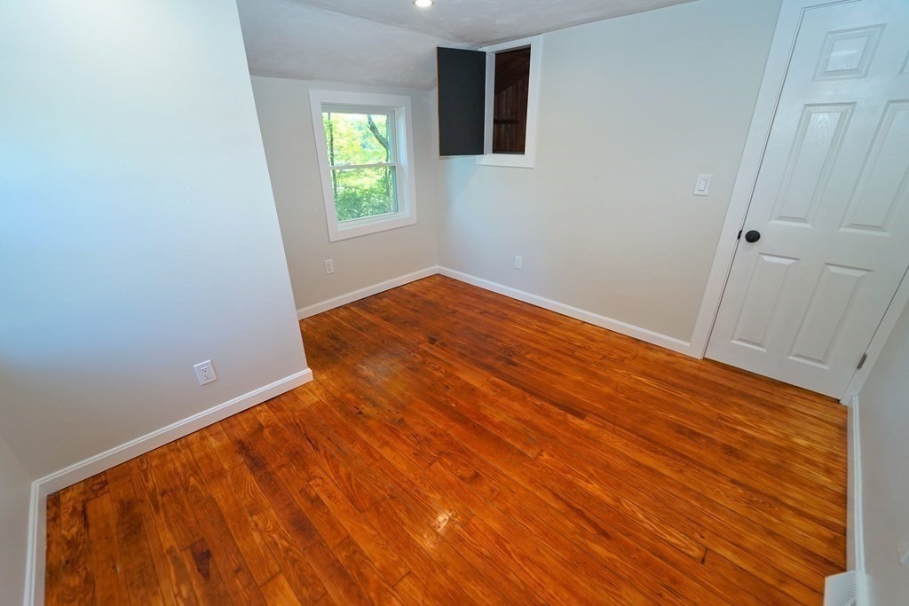 4 Juniper Road Holbrook, MA 02343 - Photo 18 of 27 a view of empty room with wooden floor