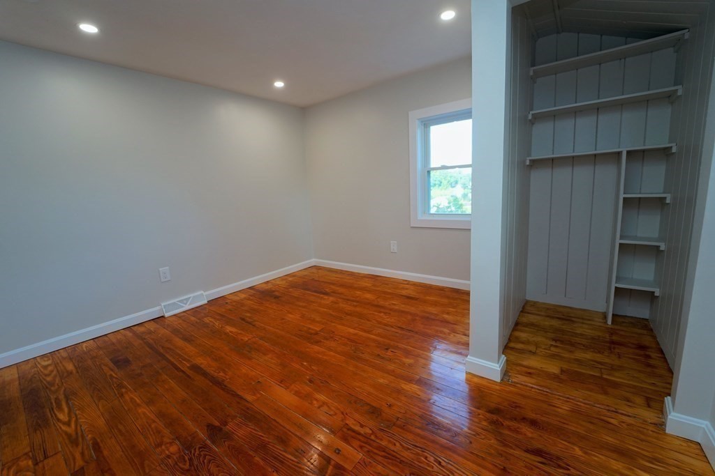 4 Juniper Road Holbrook, MA 02343 - Photo 19 of 27 a view of empty room with wooden floor