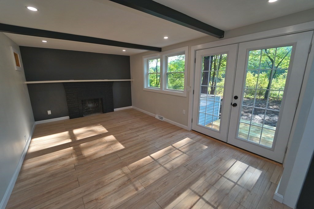 4 Juniper Road Holbrook, MA 02343 - Photo 20 of 27 a view of empty room with wooden floor and fan