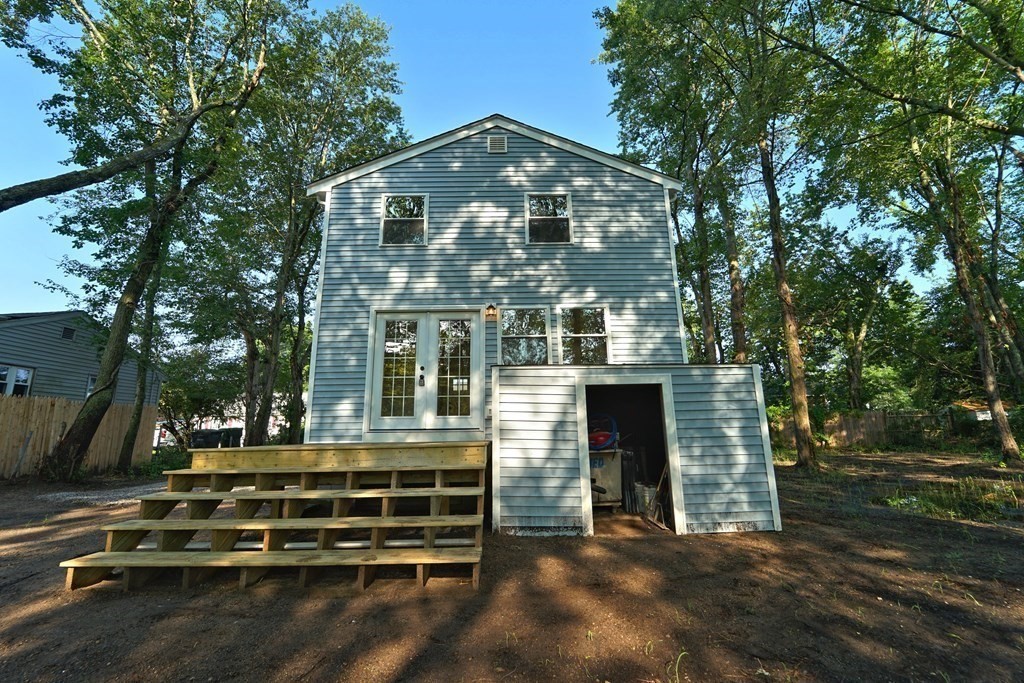 4 Juniper Road Holbrook, MA 02343 - Photo 24 of 27 a front view of a house with a yard