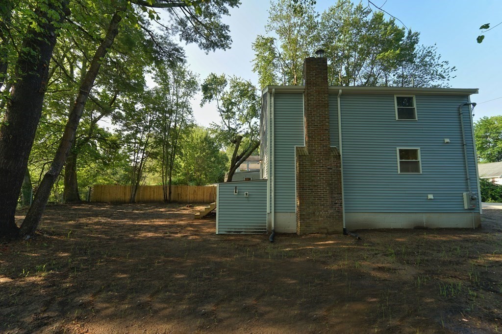 4 Juniper Road Holbrook, MA 02343 - Photo 25 of 27 a backyard of a house with lots of green space