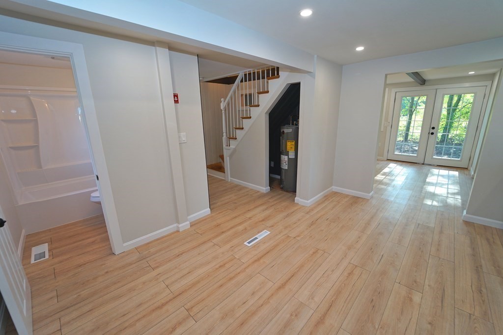 4 Juniper Road Holbrook, MA 02343 - Photo 10 of 27 a view of empty room with wooden floor and window