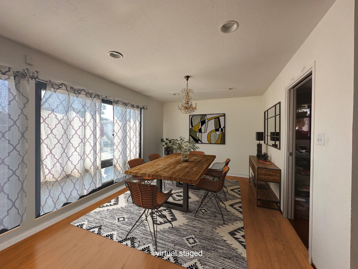 254 Sunshine Drive Pacifica, CA 94044 - Photo 4 of 5 a workspace with furniture and a large window