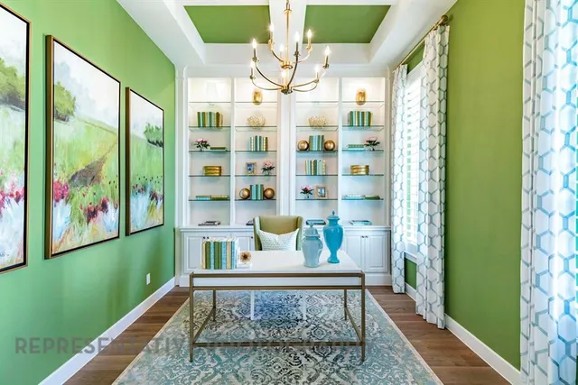 a view of a room with window and furniture