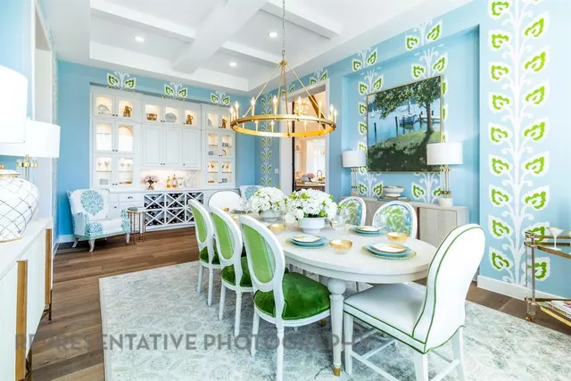 a dining room with furniture and wooden floor