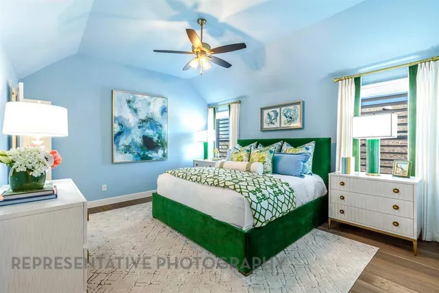 a bedroom with a large bed and a window