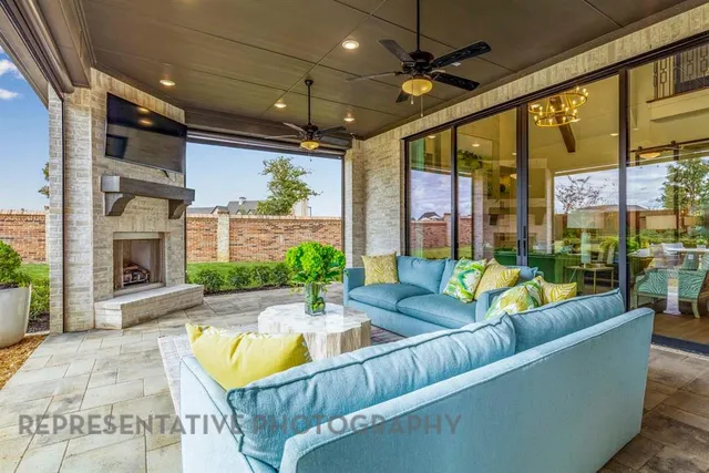 a view of an house with a couches and swimming pool