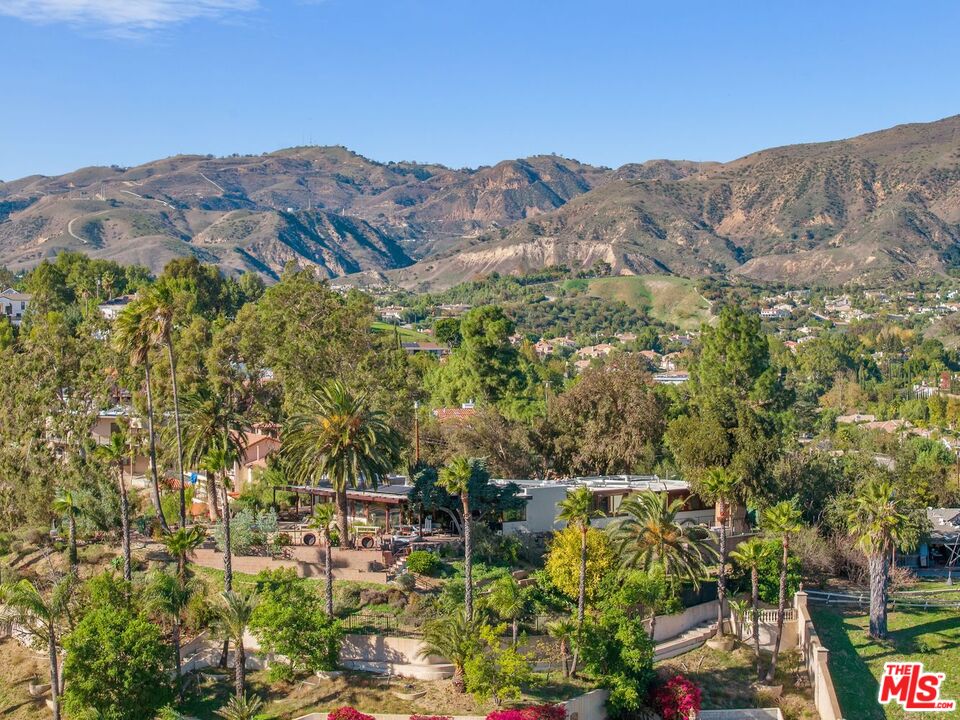 17728 Ridgeway Road Granada Hills, CA 91344 - Photo 15 of 18 a view of a city with a mountain in the background