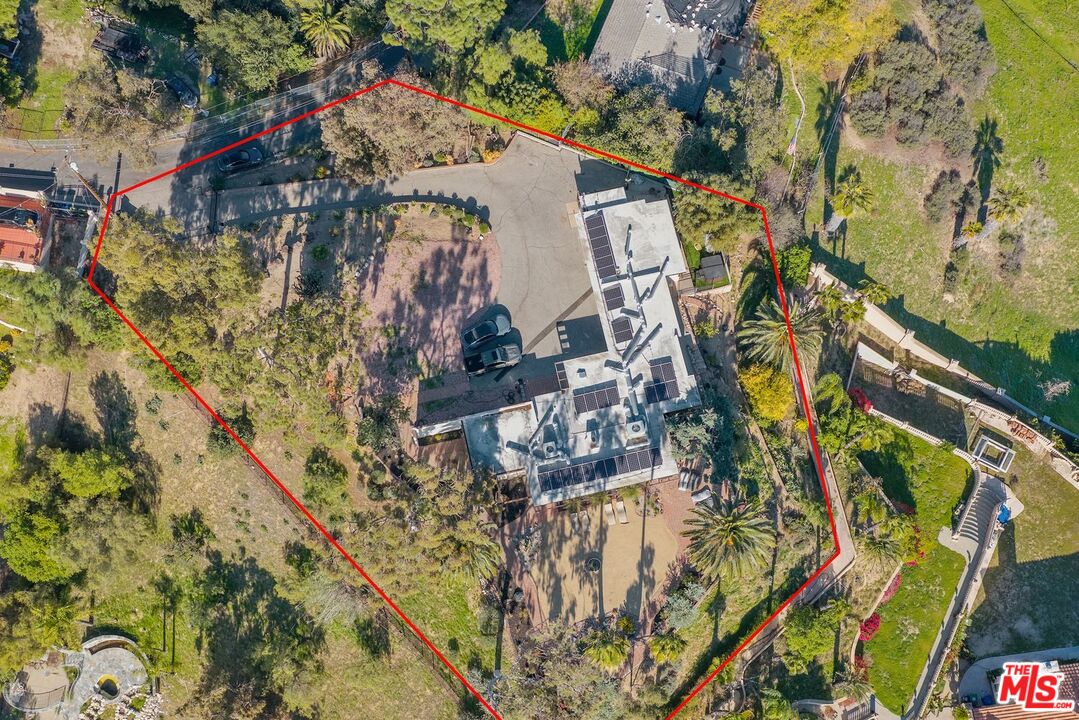 17728 Ridgeway Road Granada Hills, CA 91344 - Photo 17 of 18 view of a house with a yard