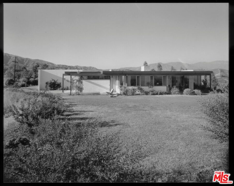 17728 Ridgeway Road Granada Hills, CA 91344 - Photo 2 of 18 a row of residential houses with outdoor space