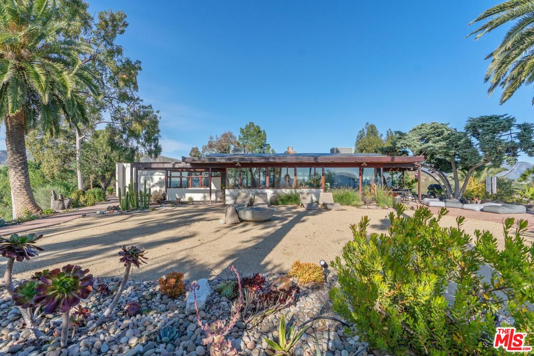 17728 Ridgeway Road Granada Hills, CA 91344 - Photo 3 of 18 a view of a swimming pool with a patio
