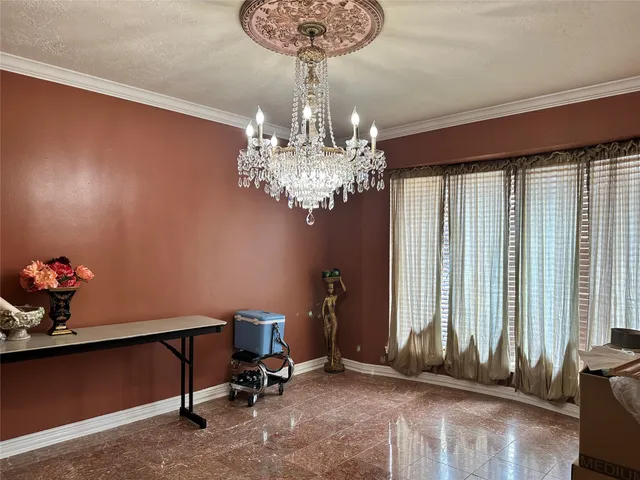 a view of a room with a chandelier