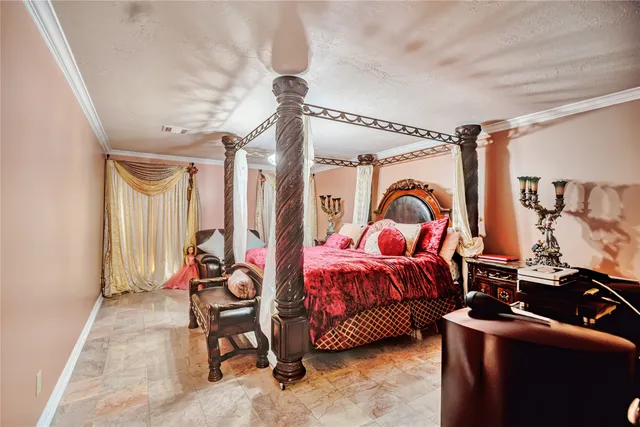 a bedroom with a bed and a mirror