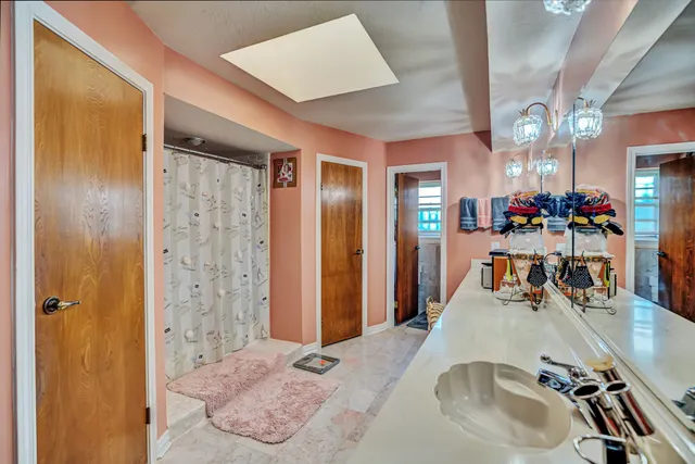 a view of a living room and dining room