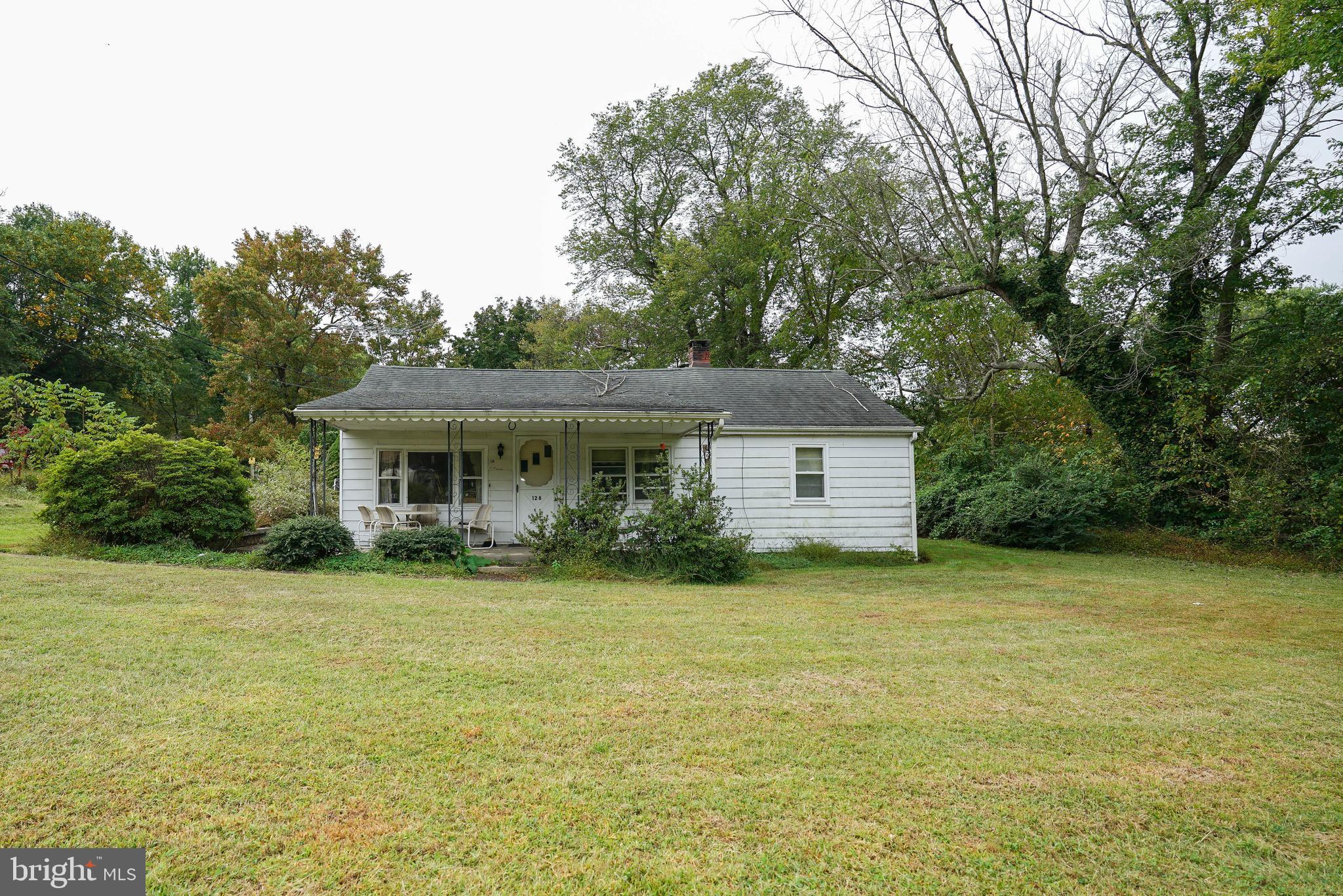 128 Woolens Road Elkton, MD 21921 - Photo 1 of 23 a front view of house with yard and green space