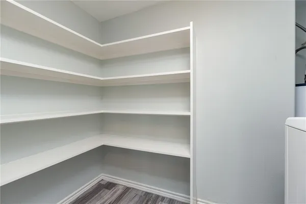 a view of an empty walk in closet